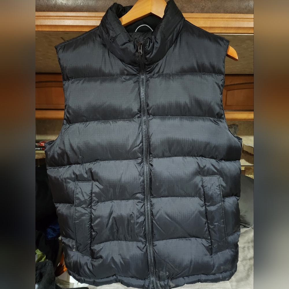 Gap down puffer vest with hideaway hood